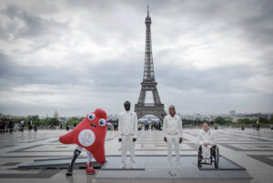 French Paralympic athletes Charles-Antoine Kouakou, Mandy François-Elie and Solene Sache pose on the Paris 2024 Paralympics podium during its presentation to the press on May 23, 2024 at the Trocadero Parvis des Droits de l'Homme (Human Rights square) in front of the Eiffel Tower in Paris. (Photo by STEPHANE DE SAKUTIN / AFP)